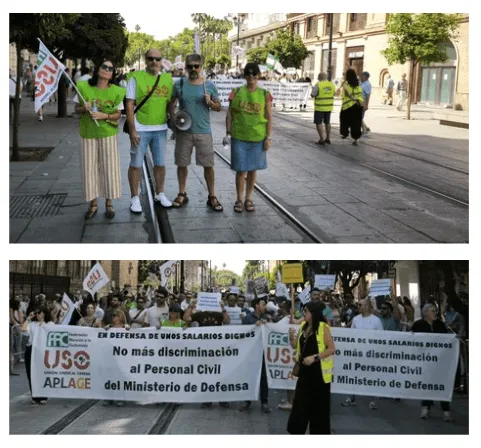 Participantes en una protesta del personal civil de Defensa con pancartas de USO.
